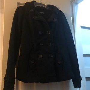 Black furry winter coat . Keeps you warm when cold